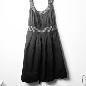 Black dress with white thread trim